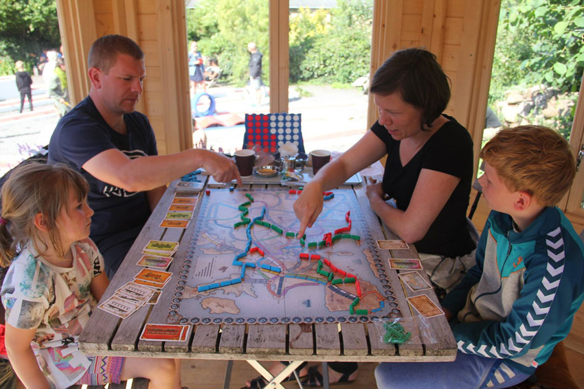 family playing a boardgame